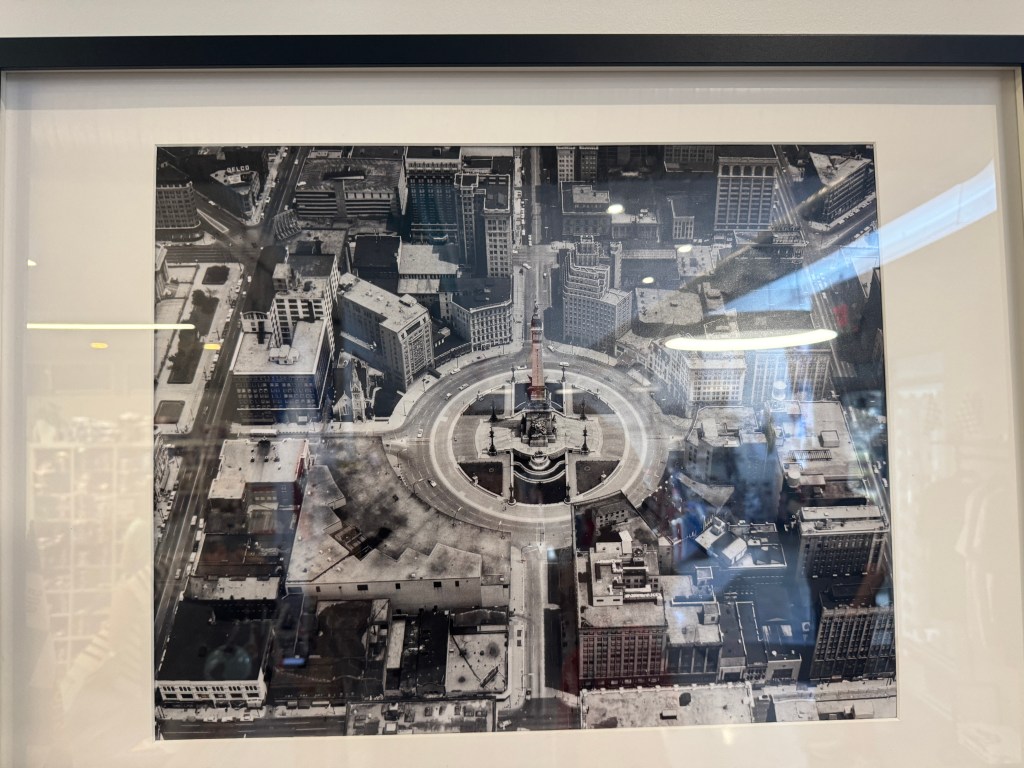A photo of a framed aerial photo of the Soldiers and Sailors Memorial in Indianapolis, Indiana.
